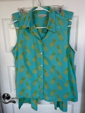 Summer PJs. Sleeveless Button-down top with drawstring shin length pants.